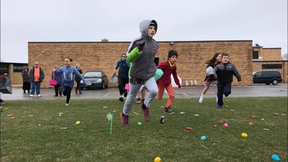 Children enjoying an outdoor activity with Grace Baptist Church
